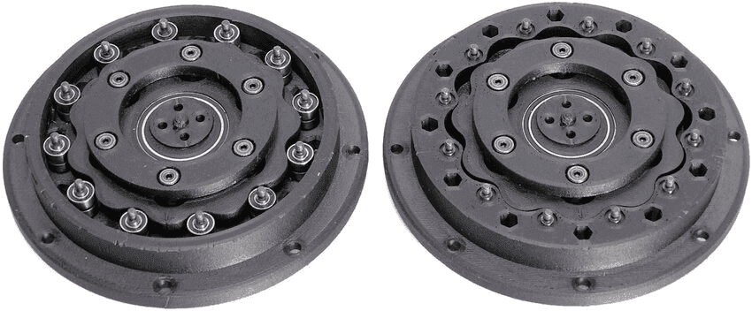 Two cycloidal drives side by side: a pinwheel design with roller pins around the outer ring, and a non-pinwheel design with the lobes formed into the housing.